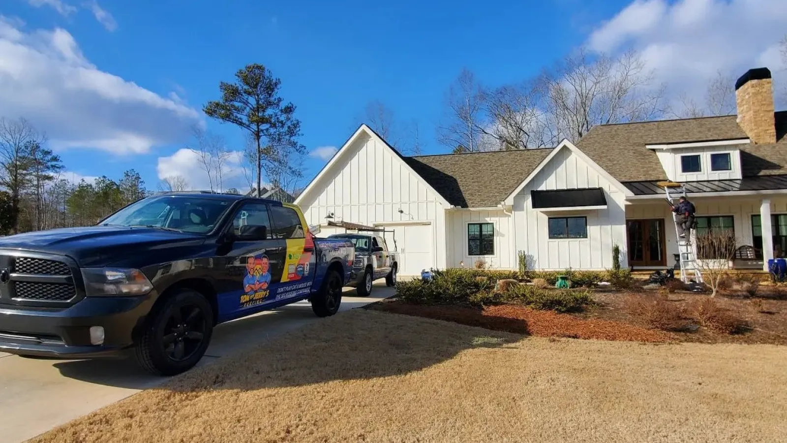 a truck parked in front of a house