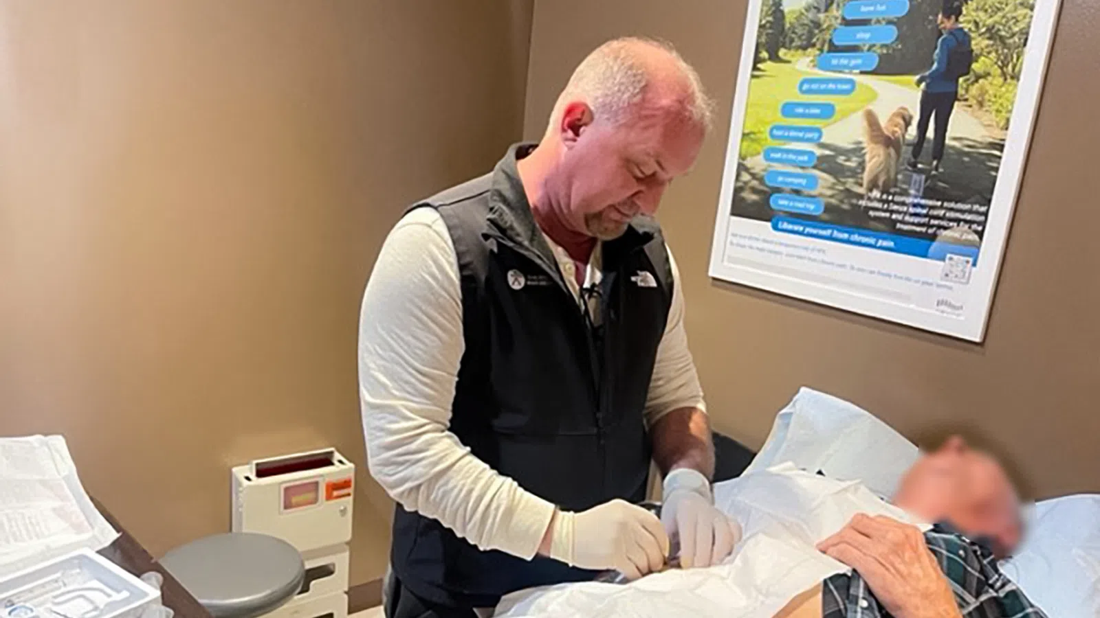 a doctor attending to a patient