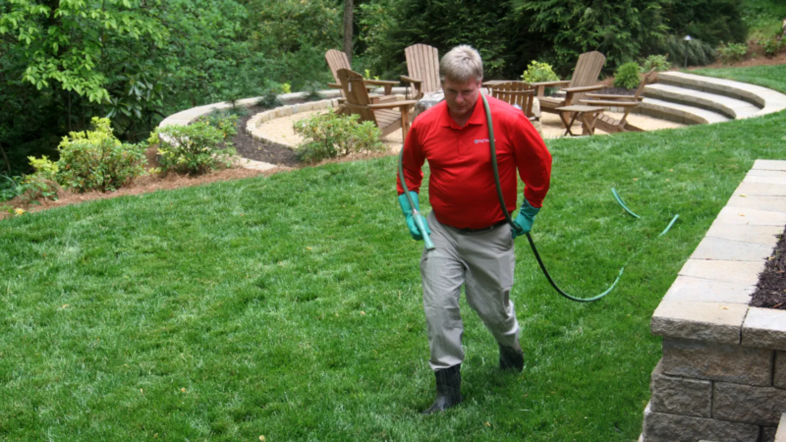 Team member fertilizing and showing great work culture