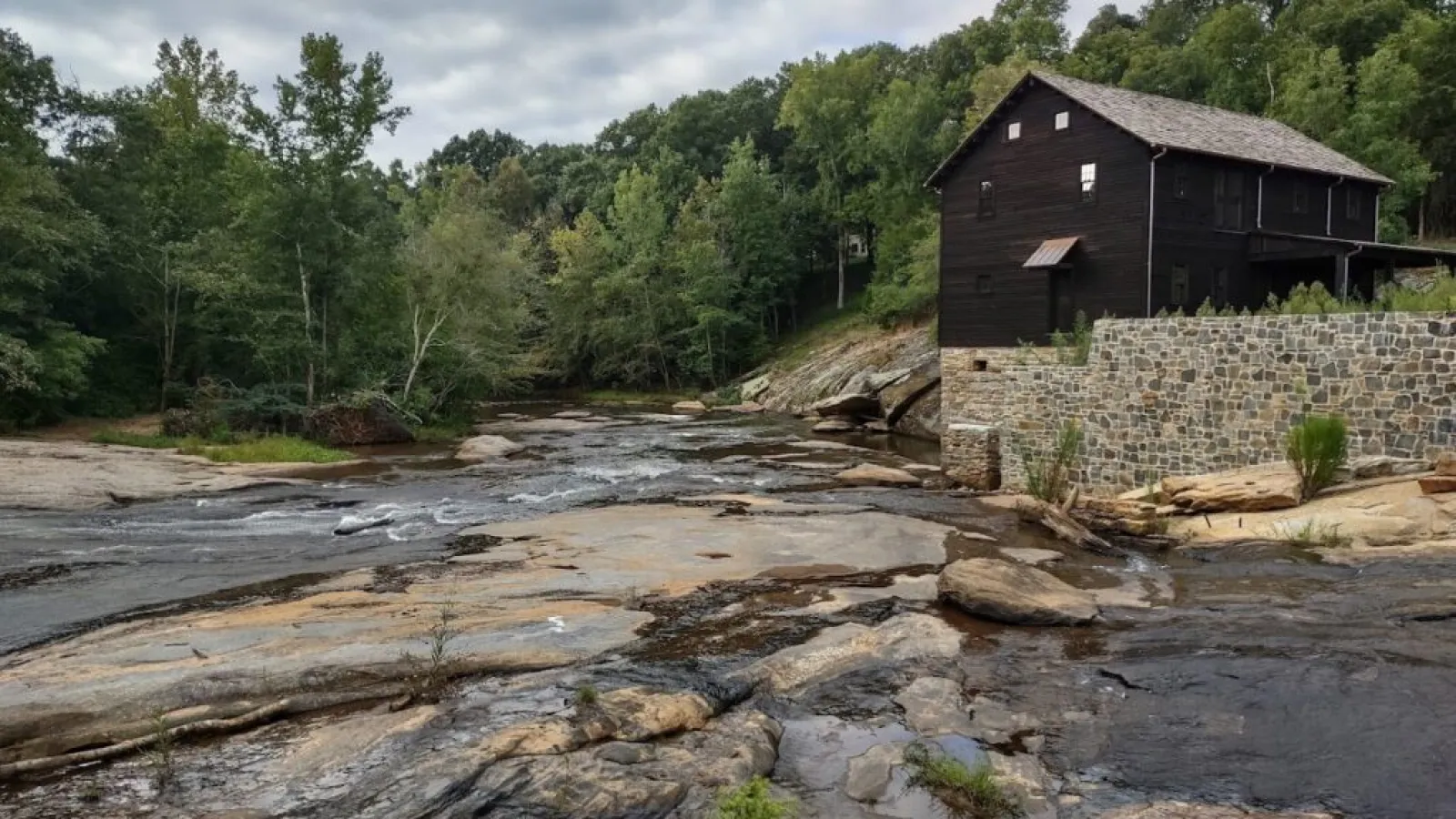 building by river
