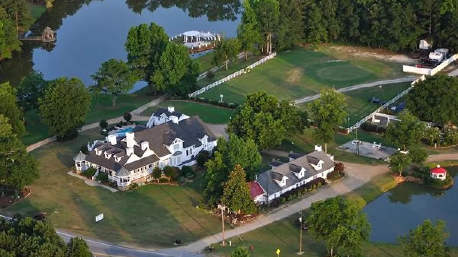 Aerial view of beautiful building and land and water