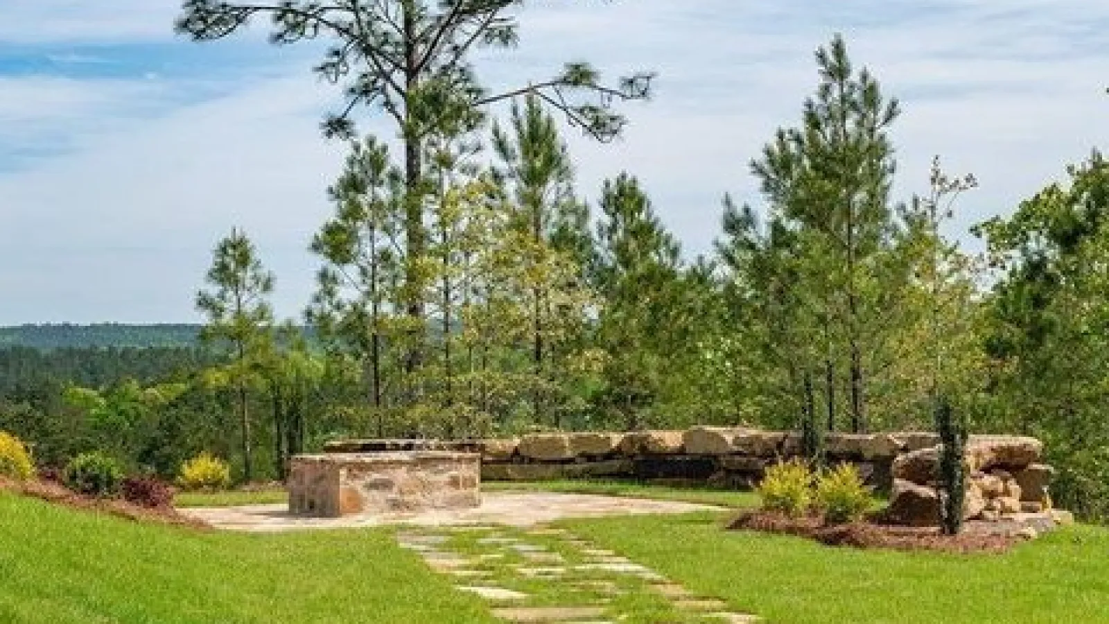 grass area with rock sitting area