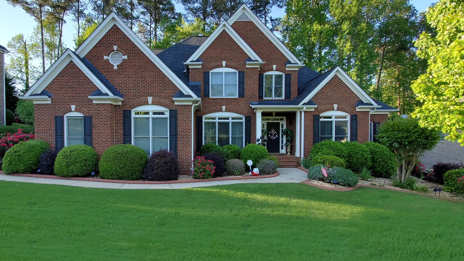 a house with a large lawn