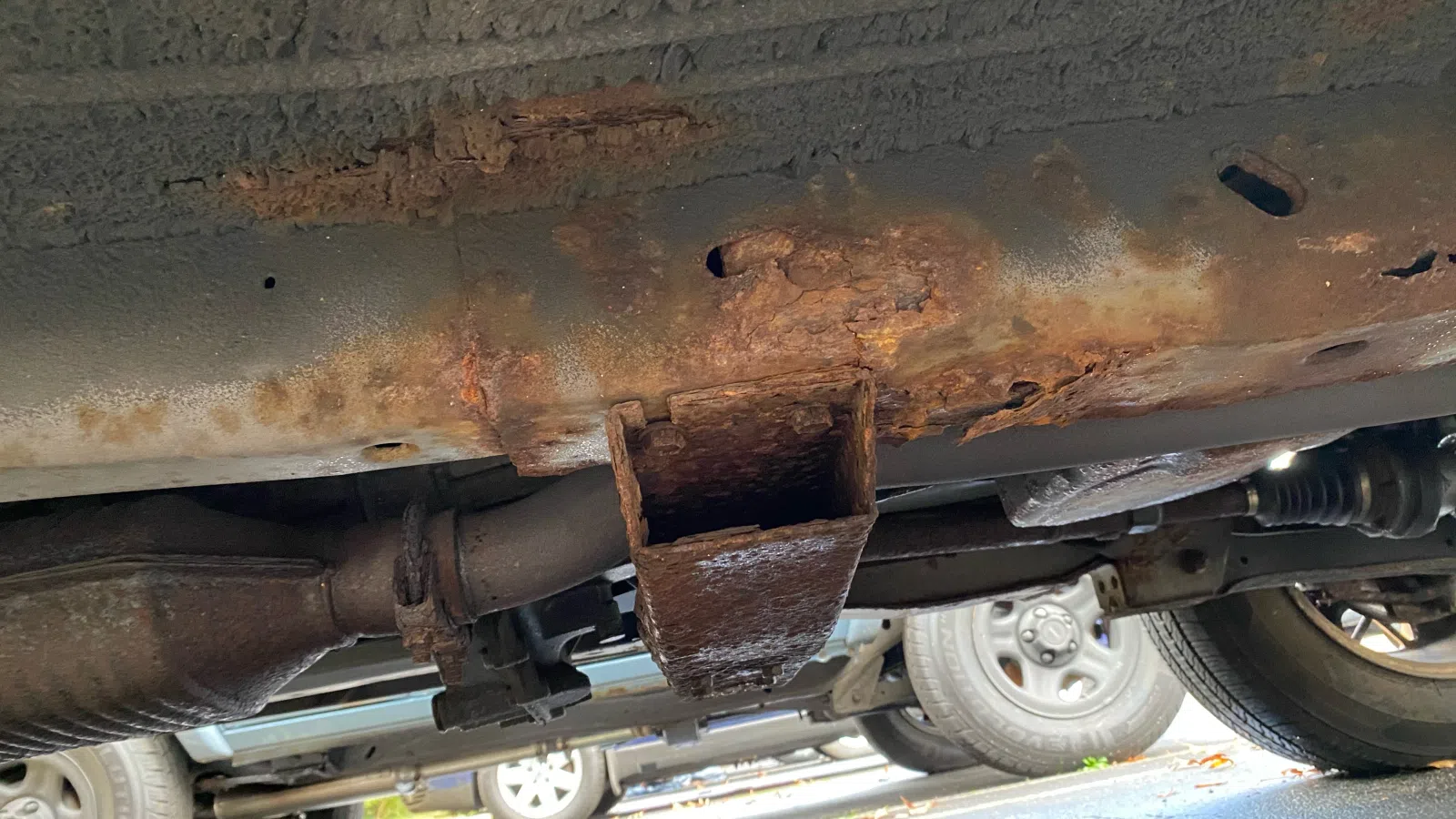 rusty undercarriage of car
