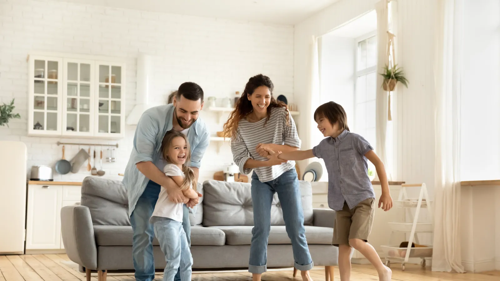 a group of people standing on a couch