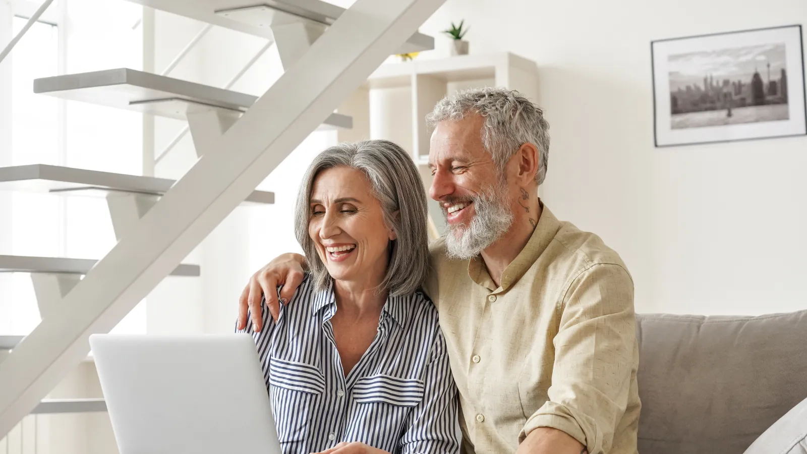 a man and a woman sitting on a couch