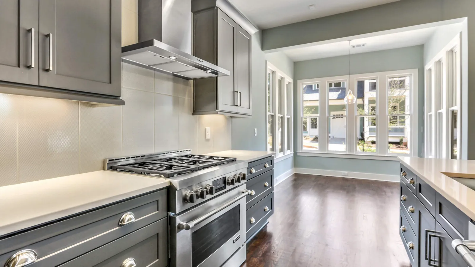 a kitchen with black appliances