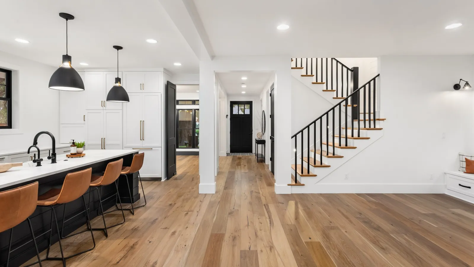 a kitchen with a wood floor