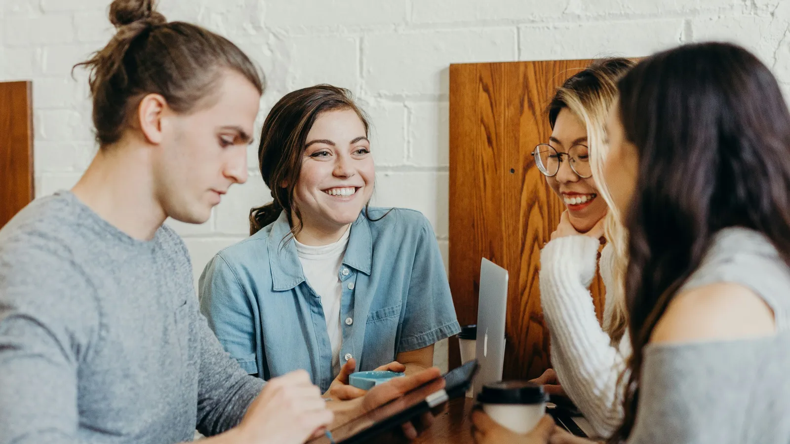 a group of women sitting at a table