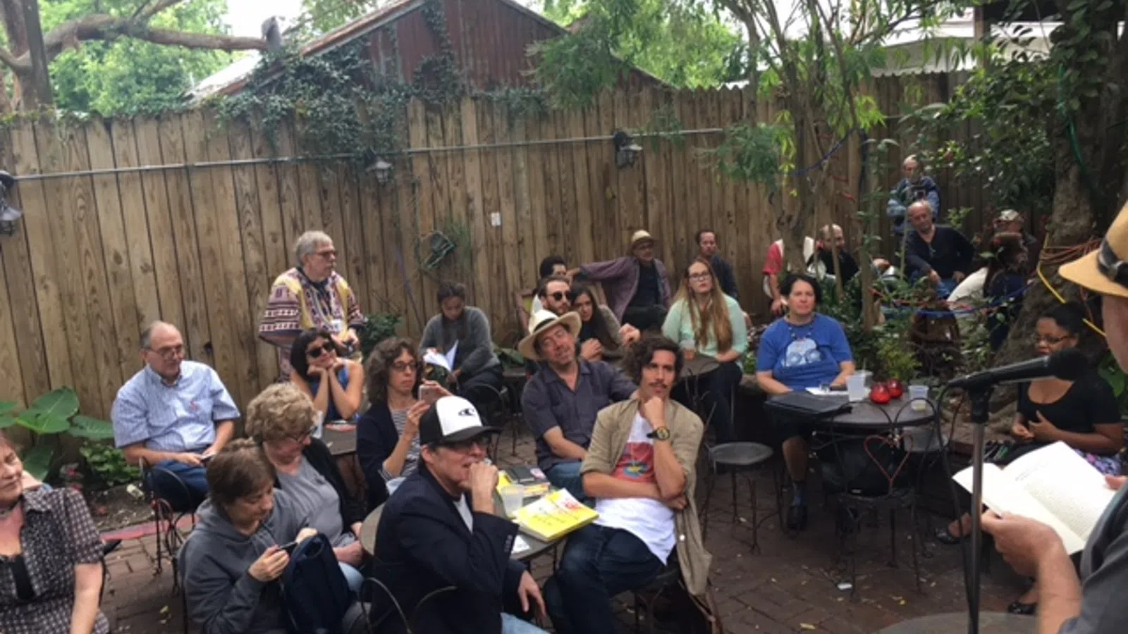 a group of people sitting outside