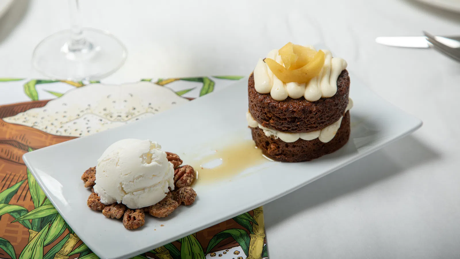 a couple of cupcakes with whipped cream and chocolate on a plate