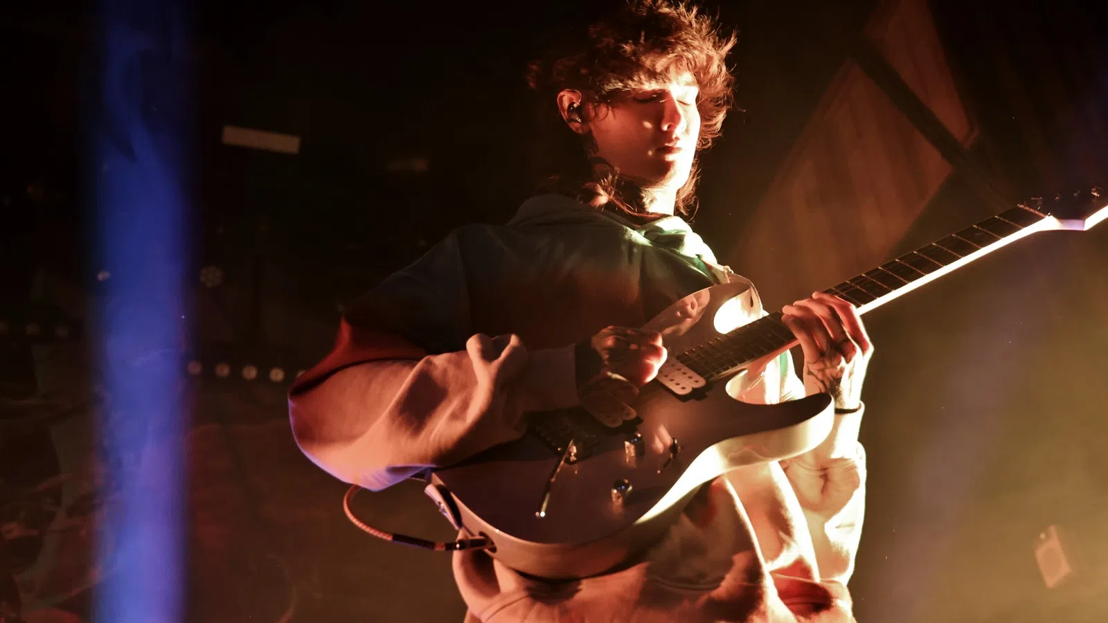 a person playing a guitar