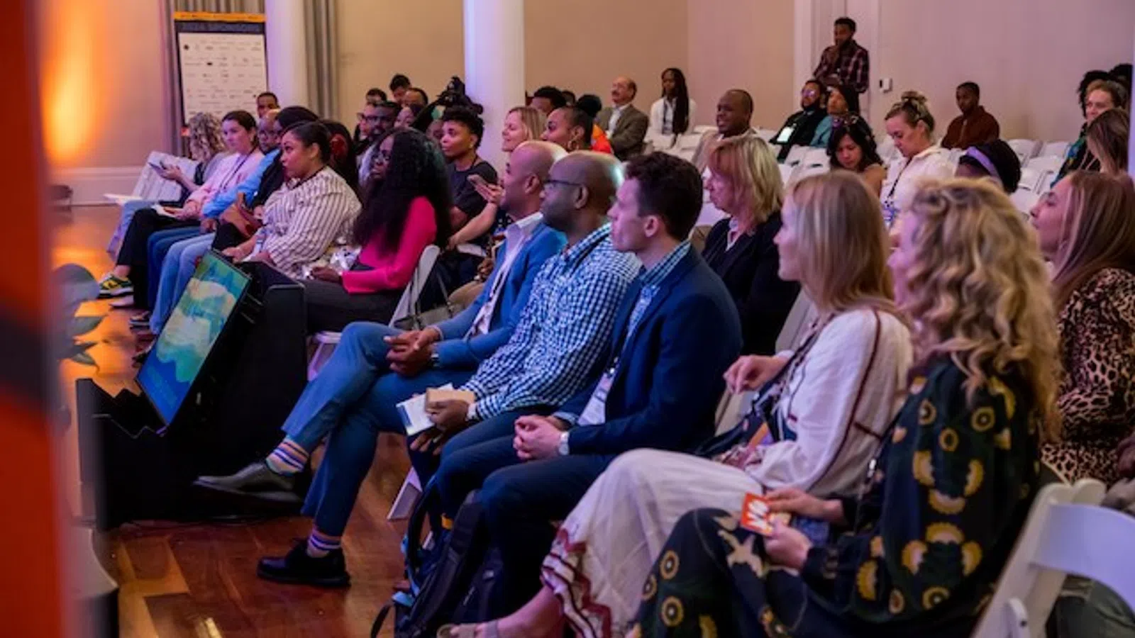 a group of people sitting in a room