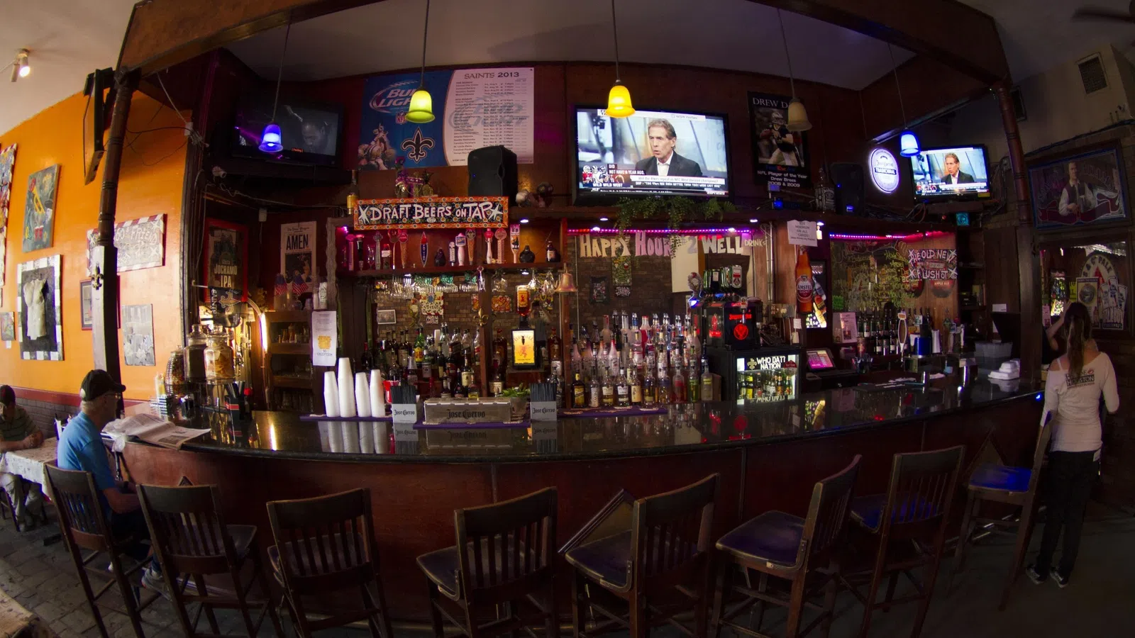 a bar with a bar and chairs