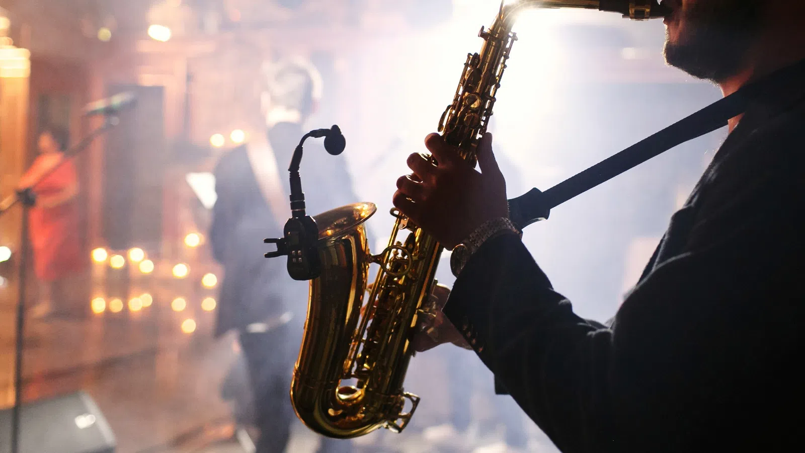 a man playing a saxophone