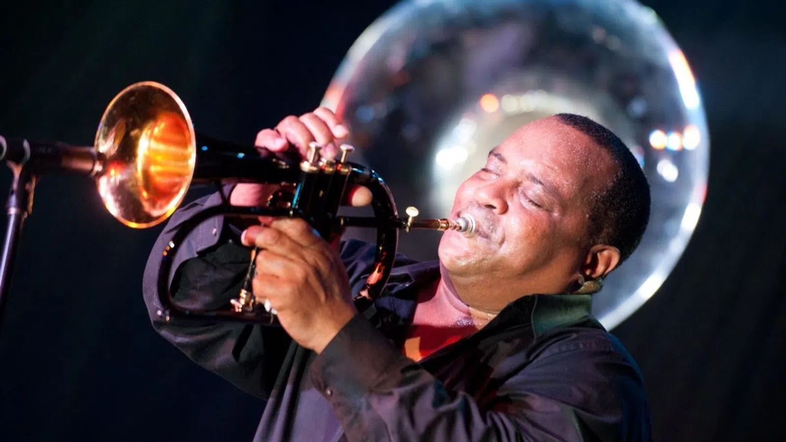 a man playing a trumpet