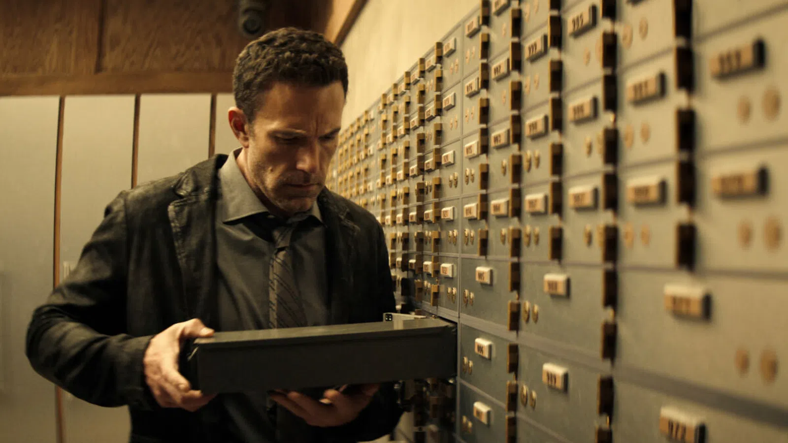 a man looking at a computer