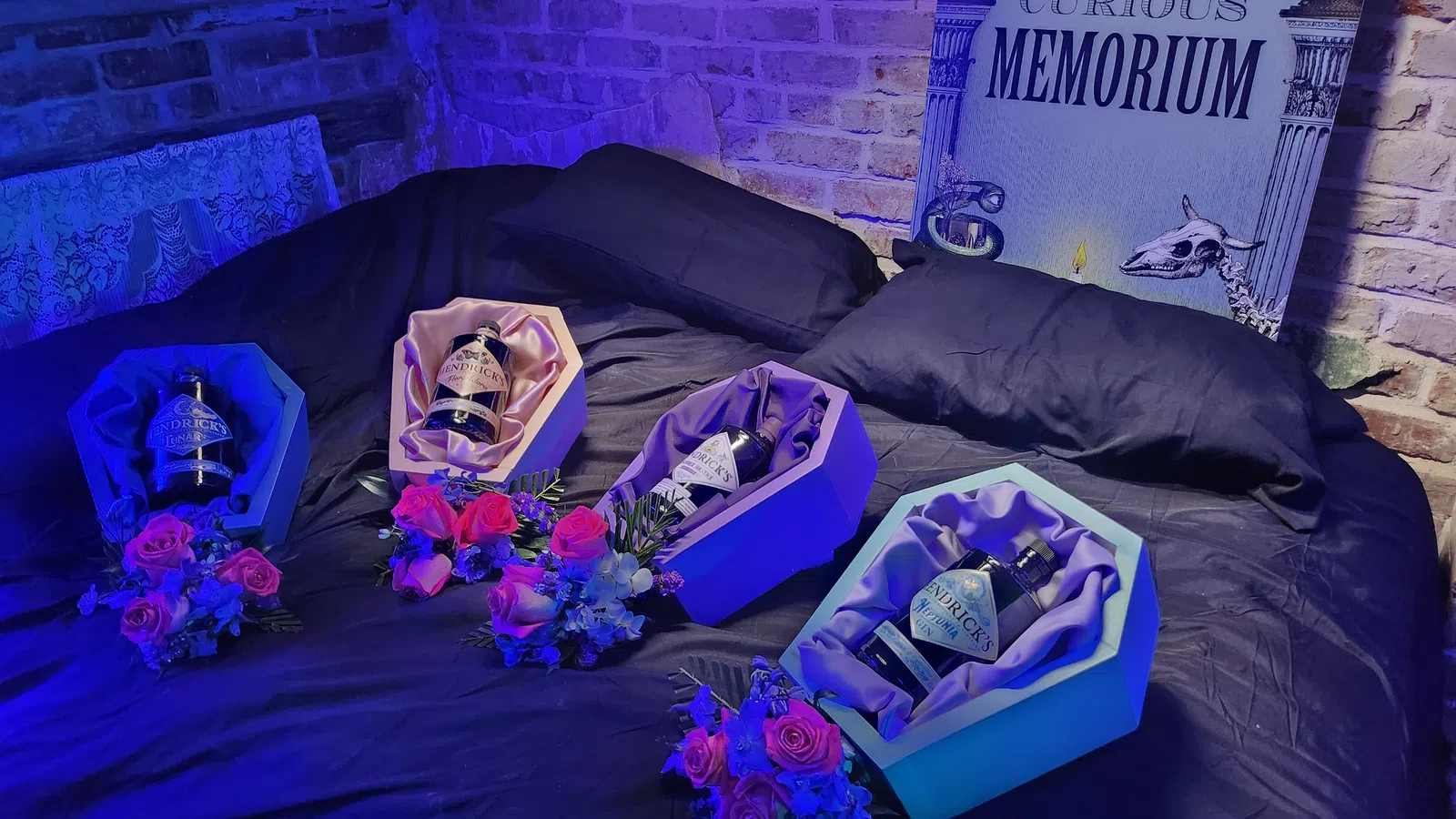 a group of pillows on a bed
