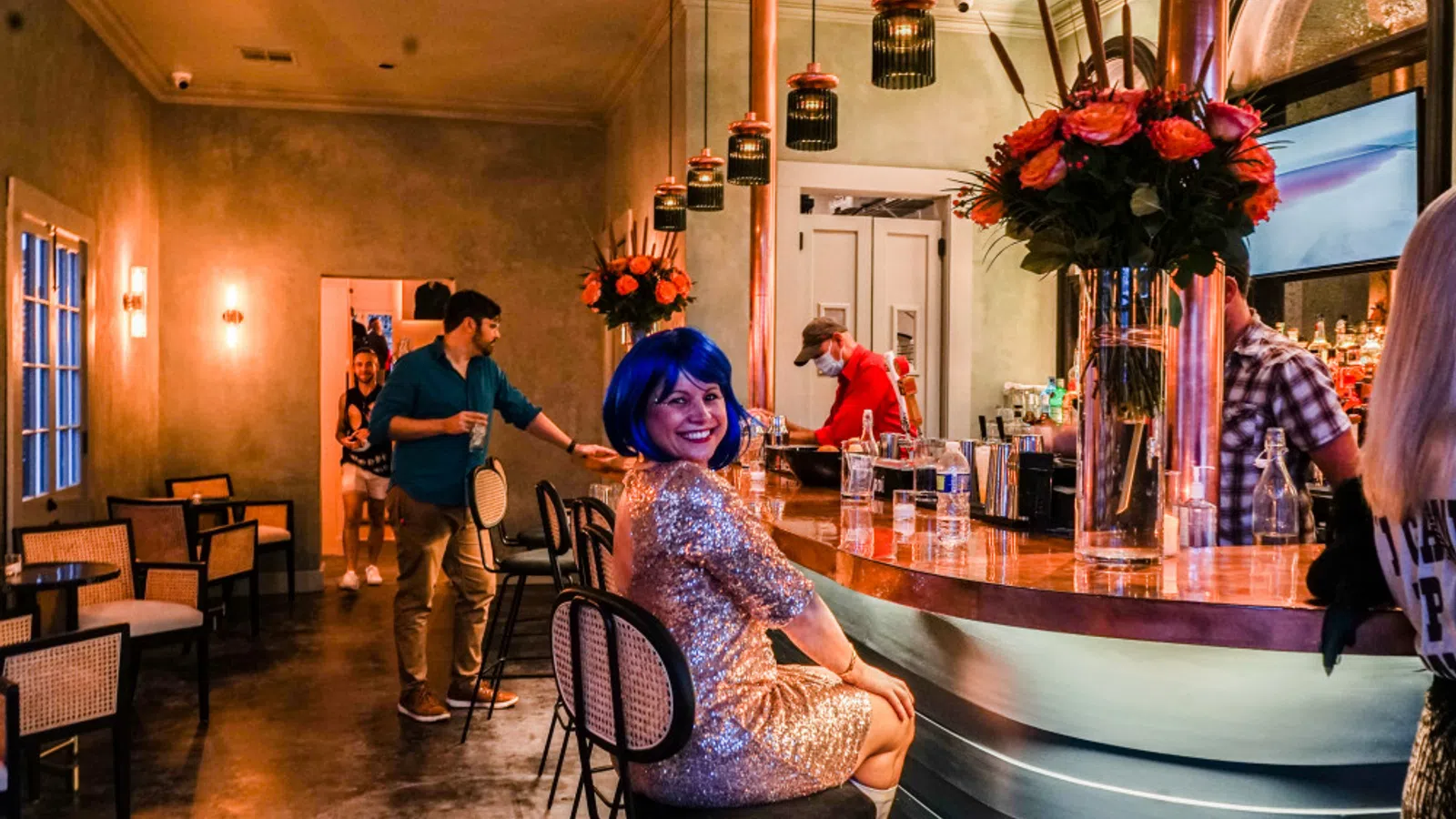 a person sitting at a bar