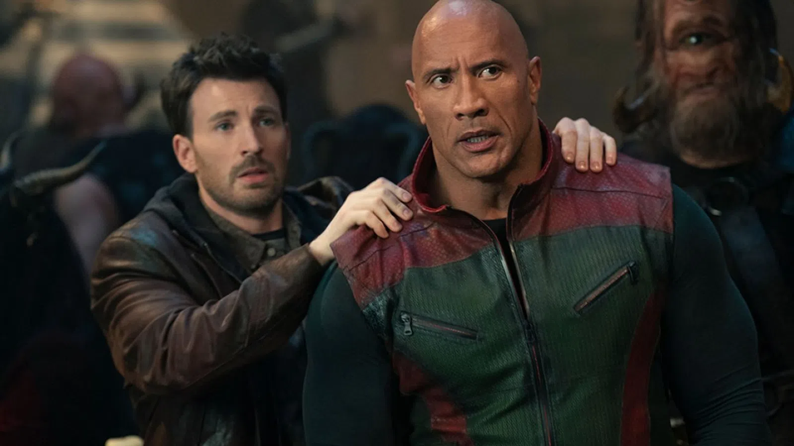Dwayne Johnson, Chris Evans are posing for a picture
