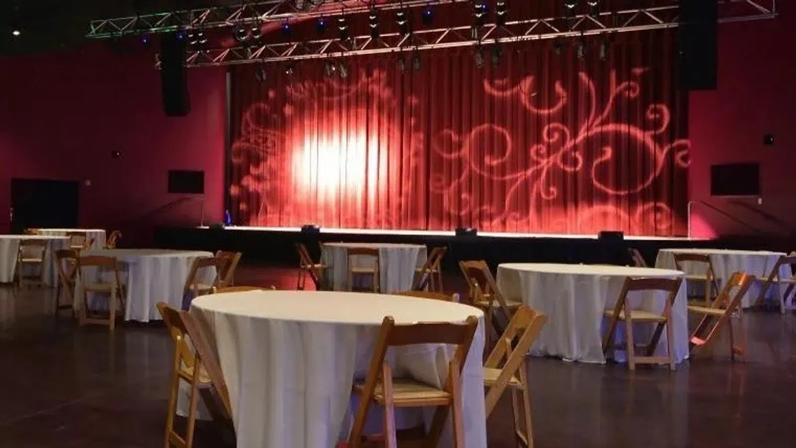 a room with tables and chairs
