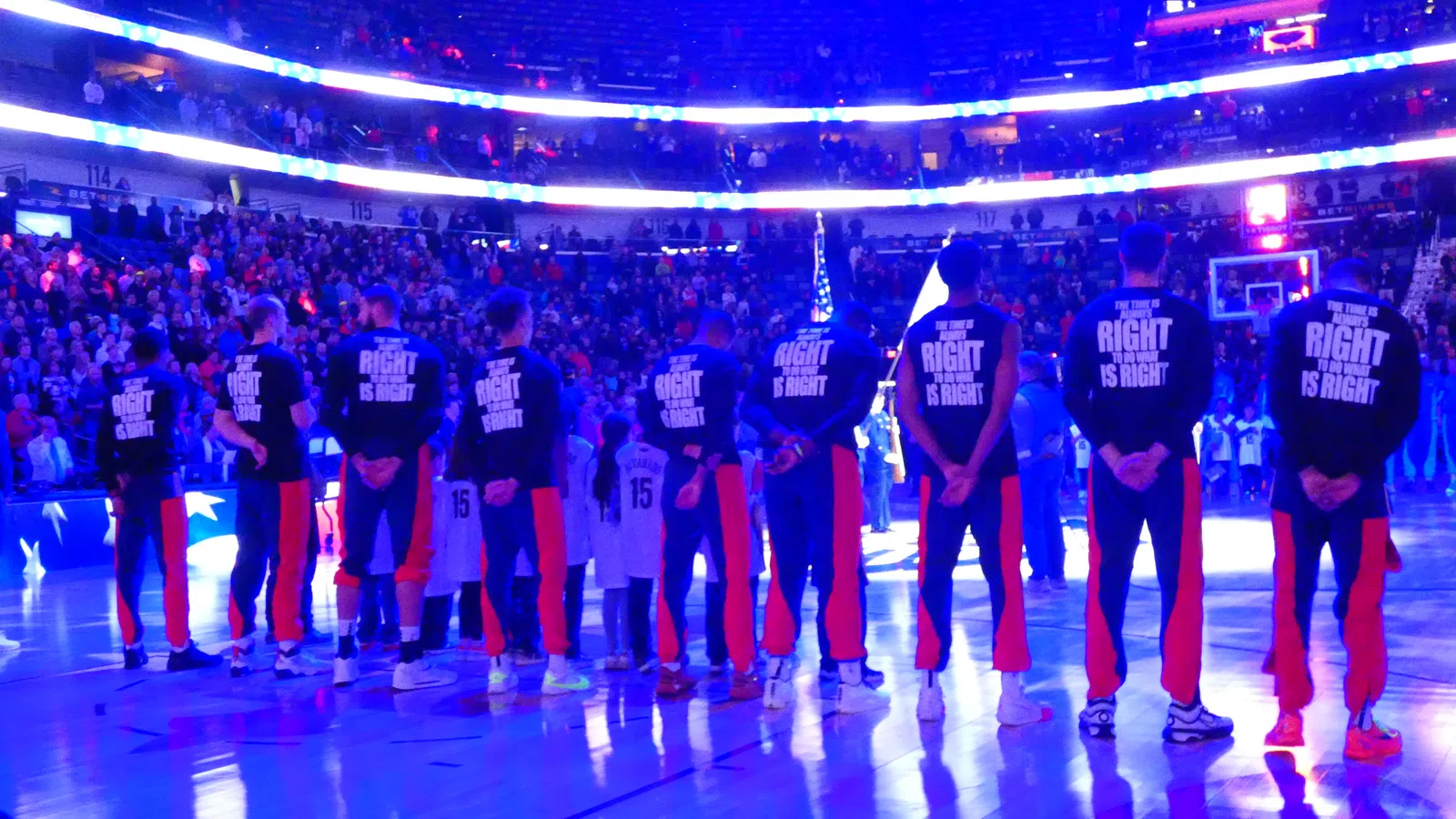 a group of people in a hockey rink