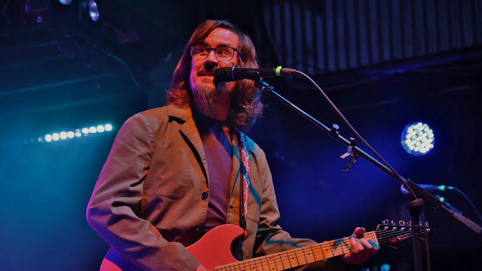 a person playing a guitar