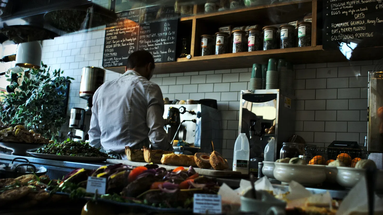 a person standing in a kitchen