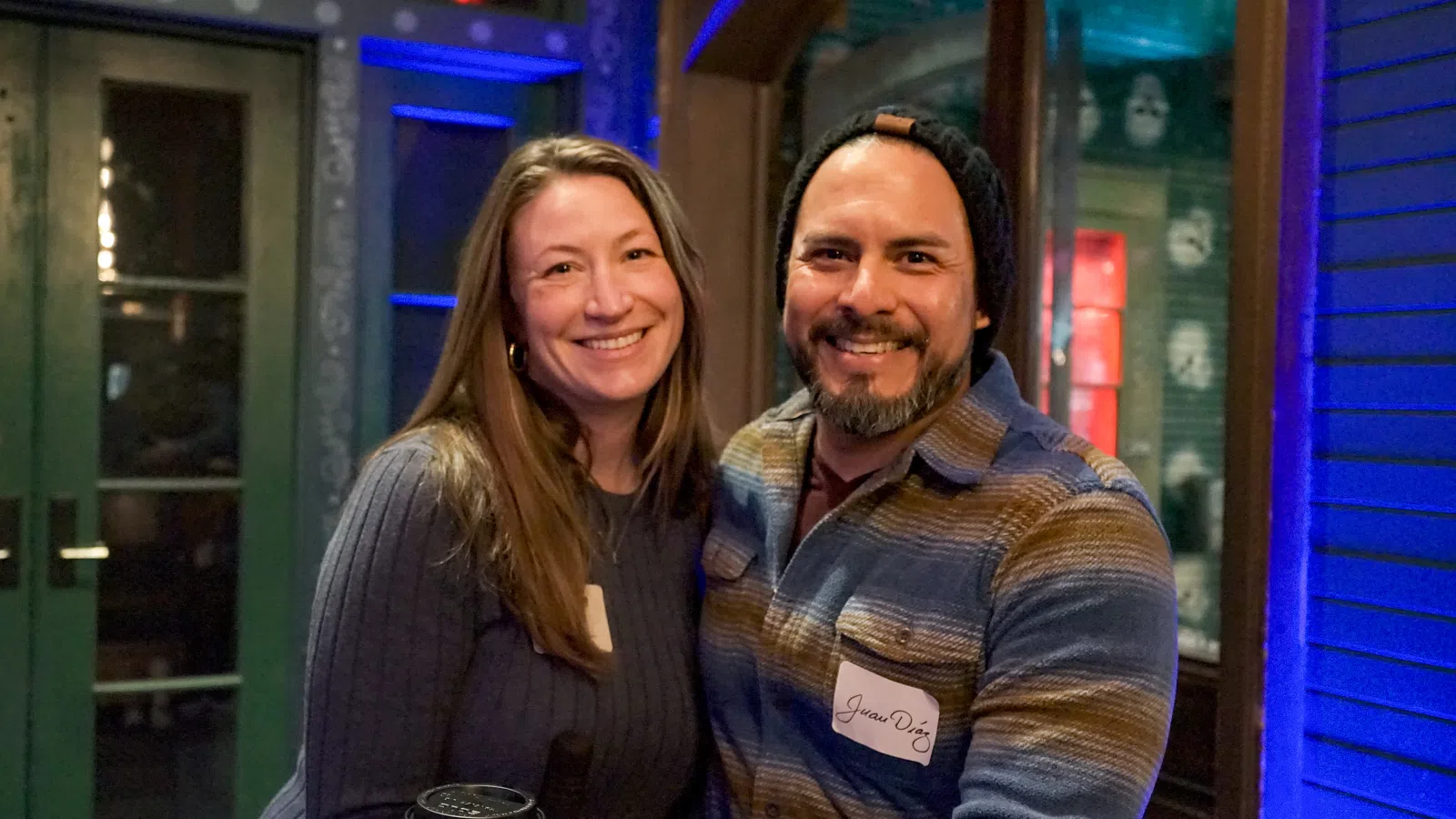 a man and woman posing for a picture