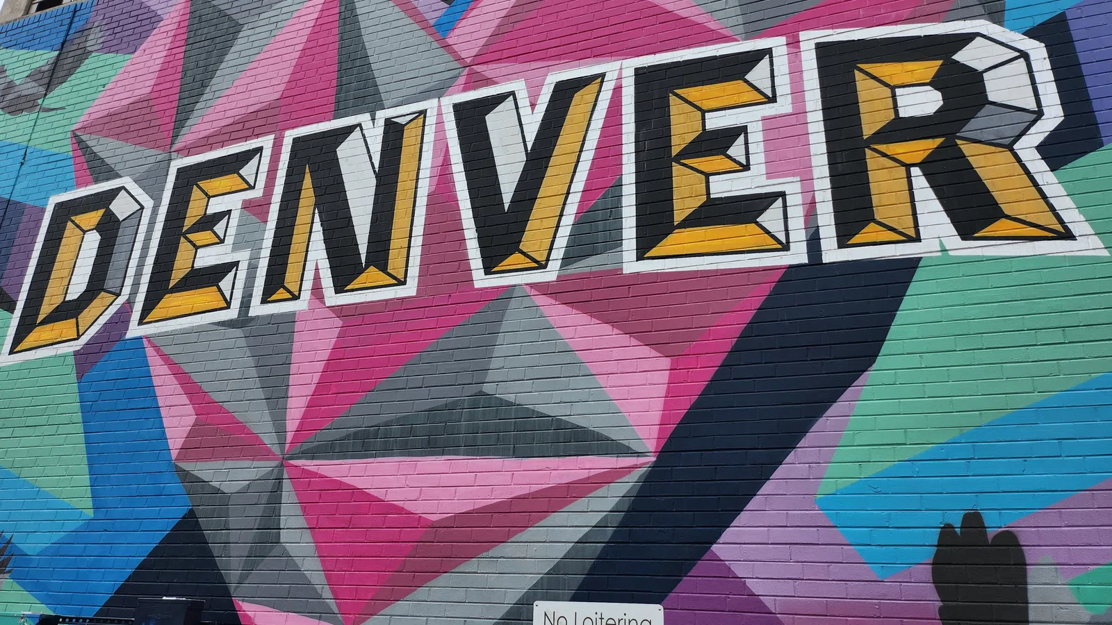 a wall with graffiti