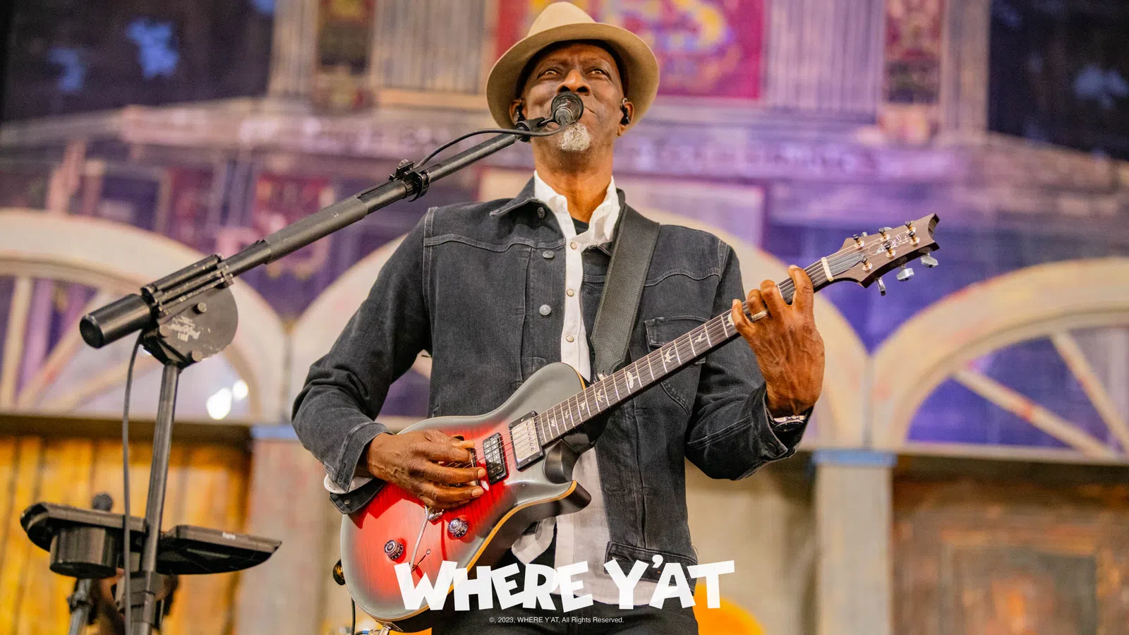 a person playing a guitar