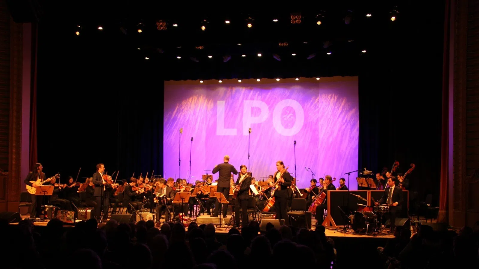 a group of people on a stage