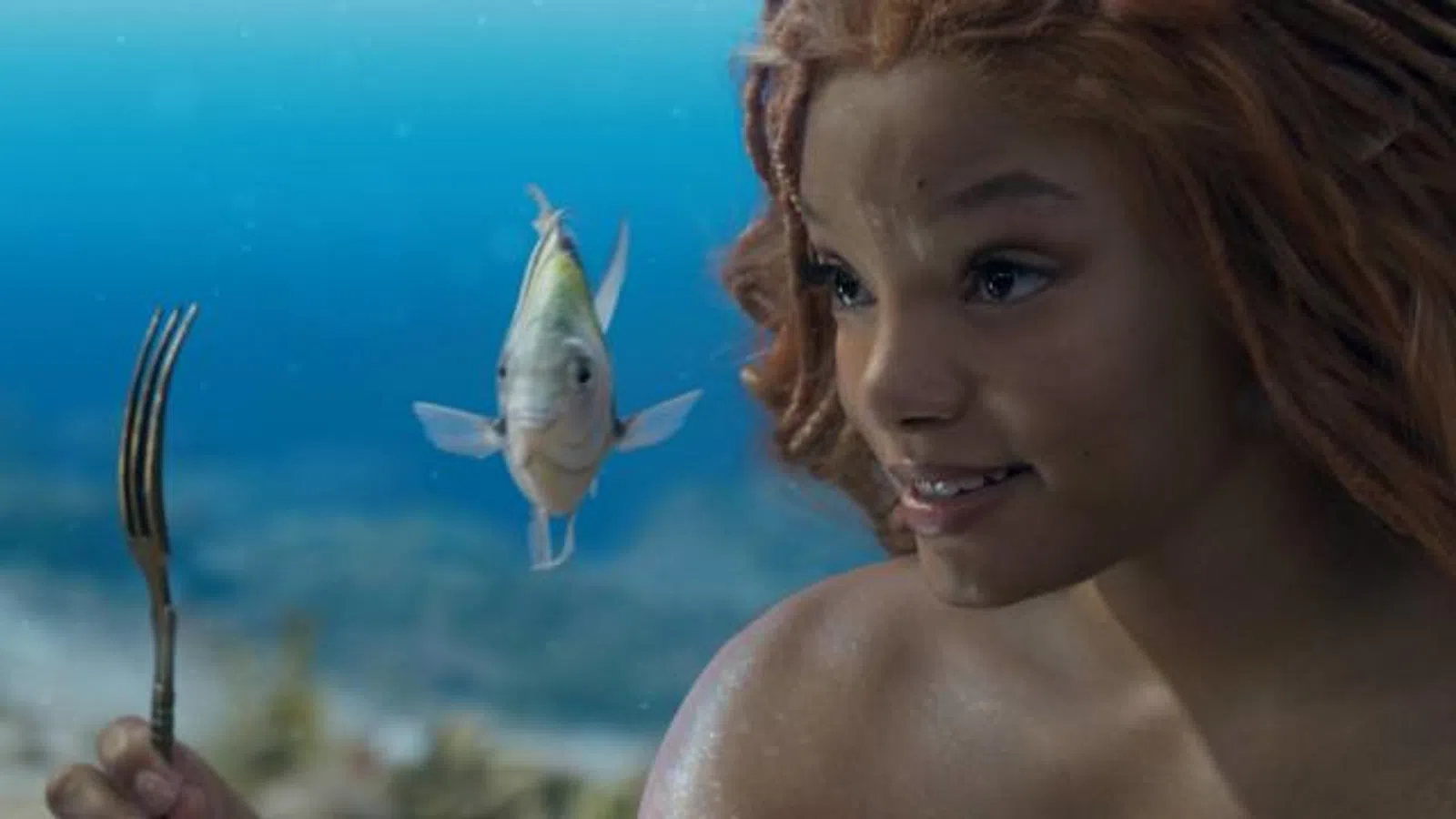 Chloe Bailey with a fish