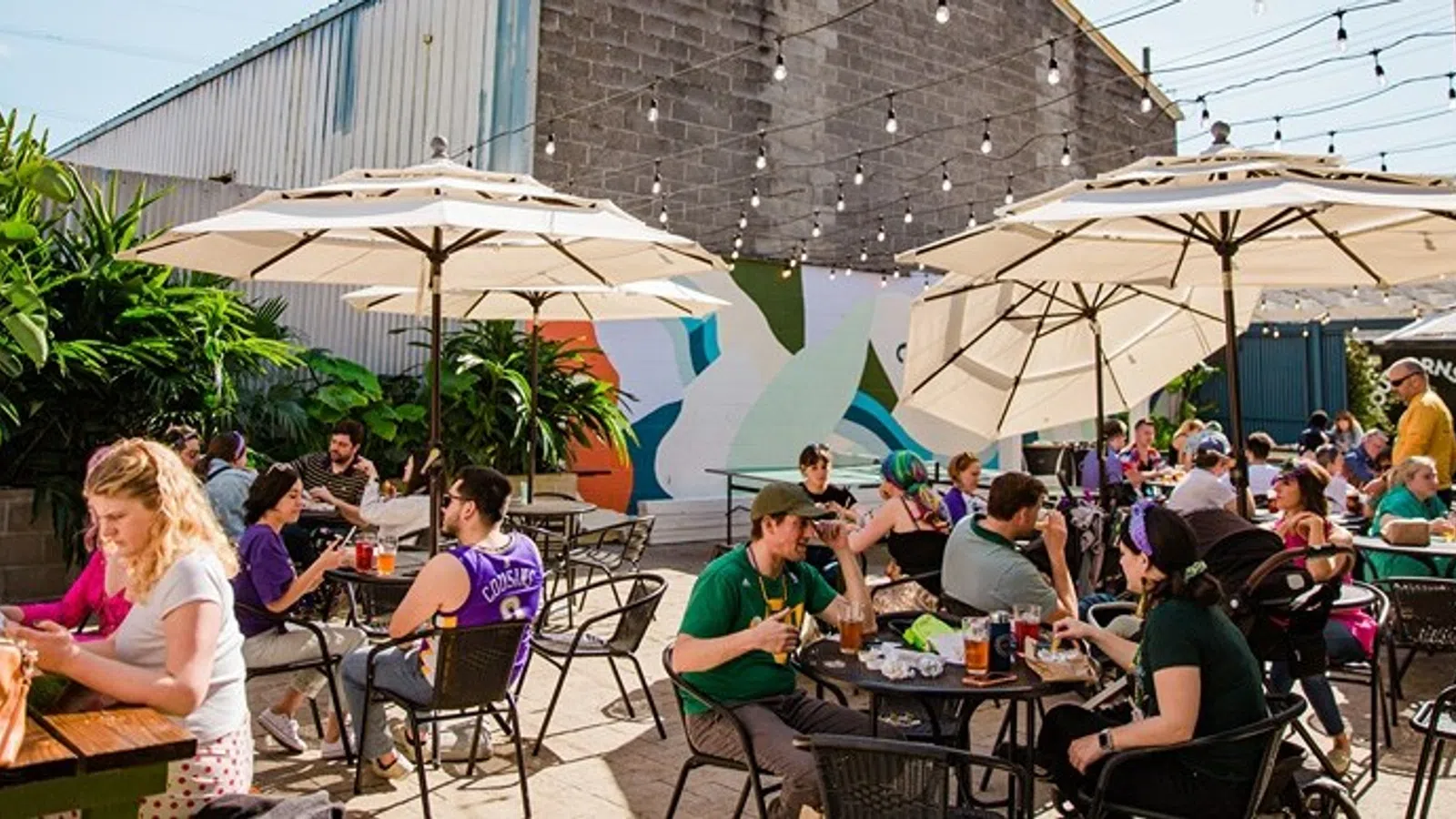 a group of people sitting at tables