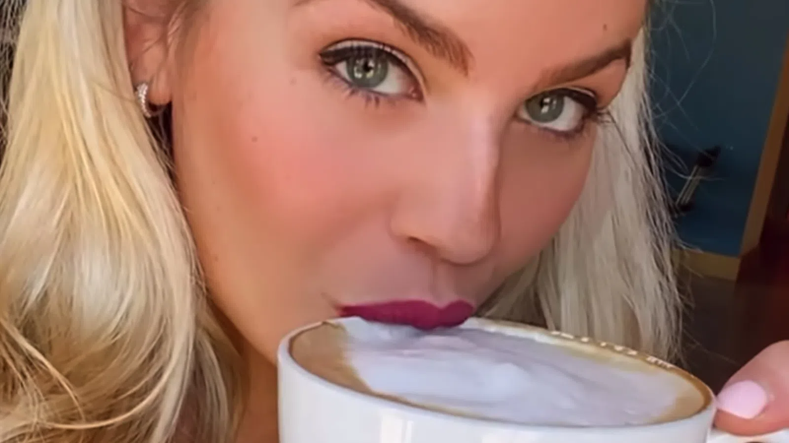 a woman eating a bowl of food