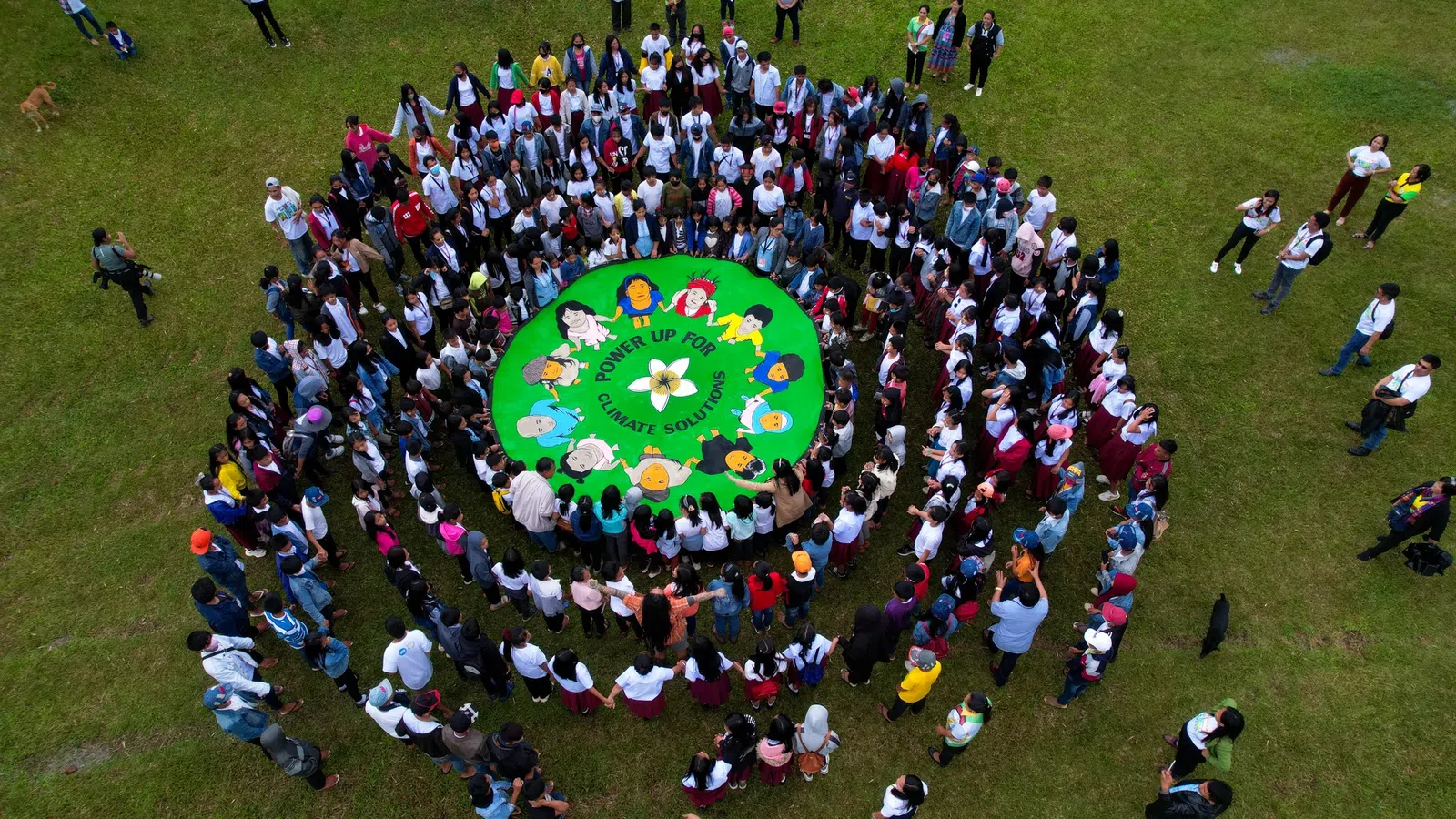 a group of people on a football field