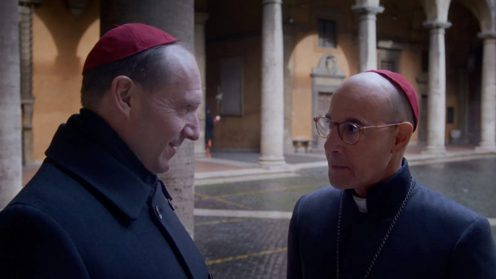 a person in a red hat and a person in a black jacket