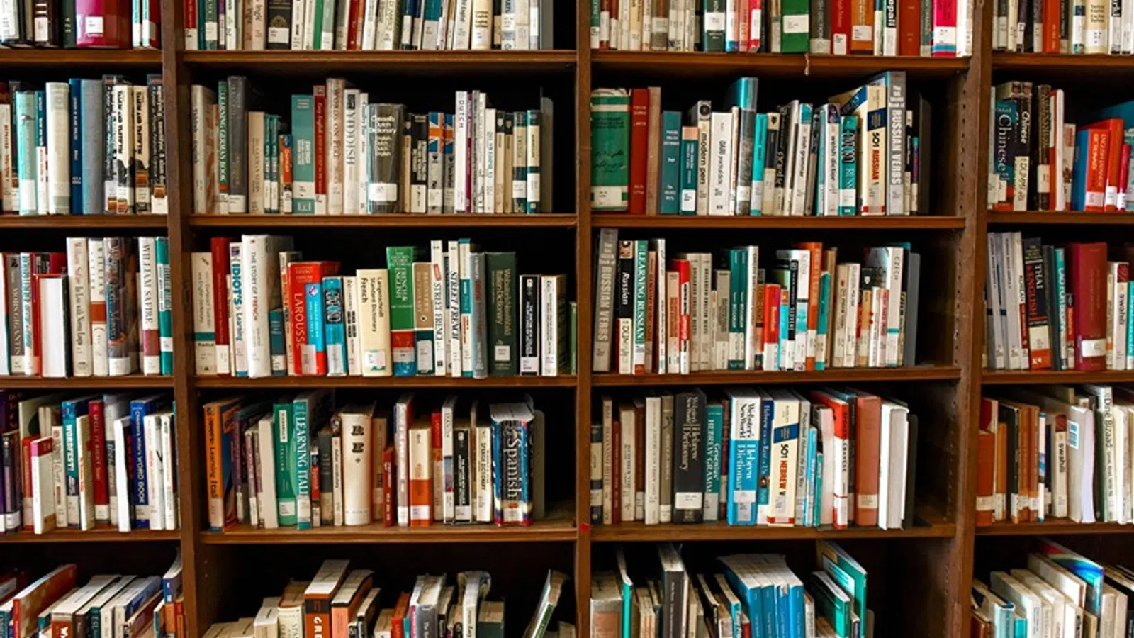 a shelf with many books on it