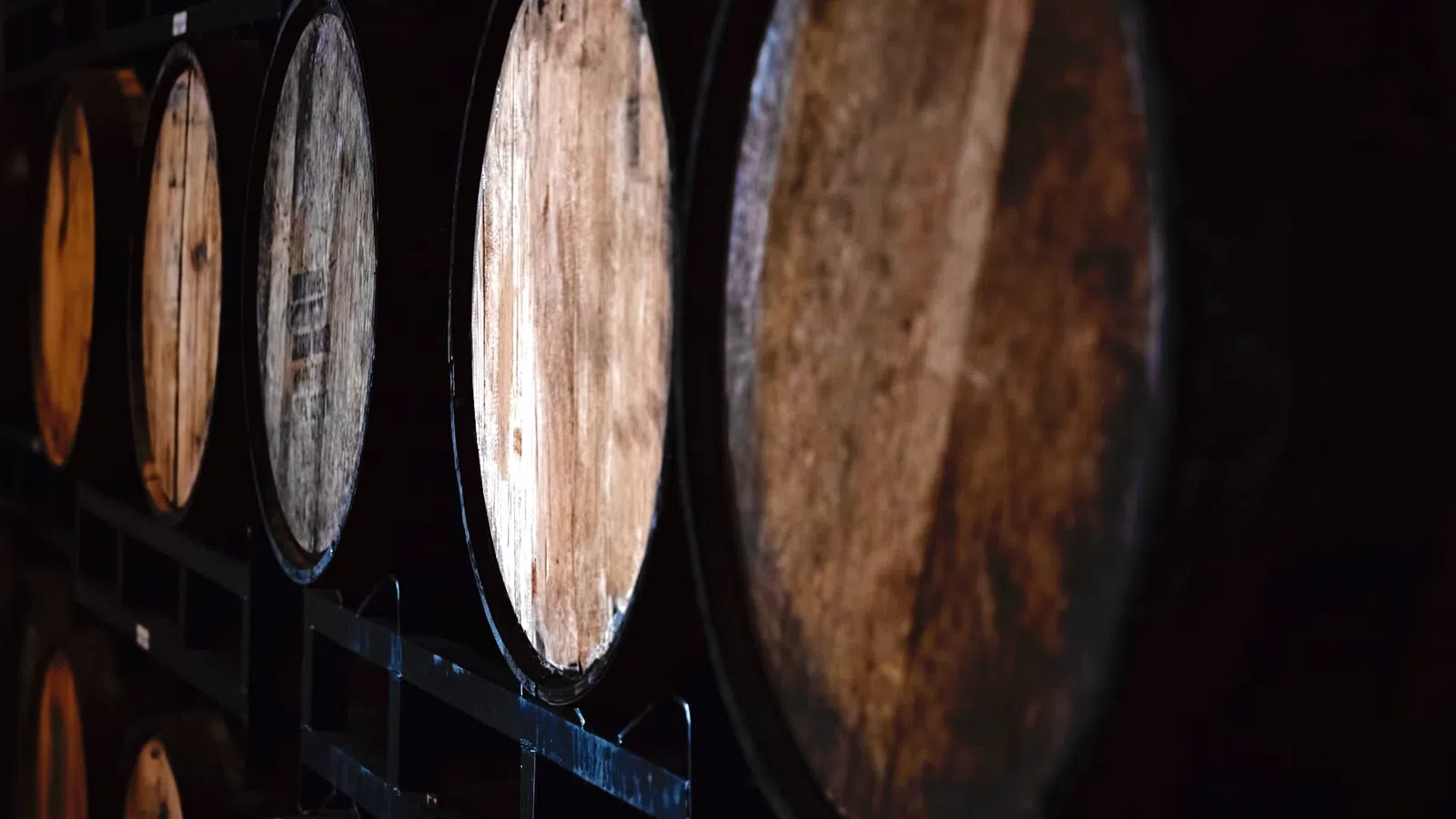 a row of brown and black drums