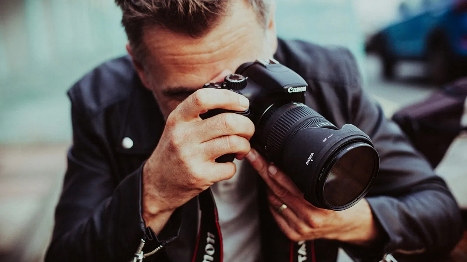 a man holding a camera