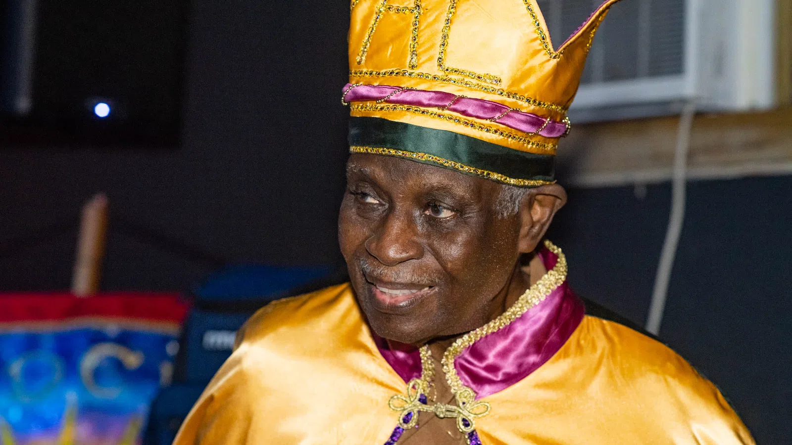 a person wearing a colorful headdress