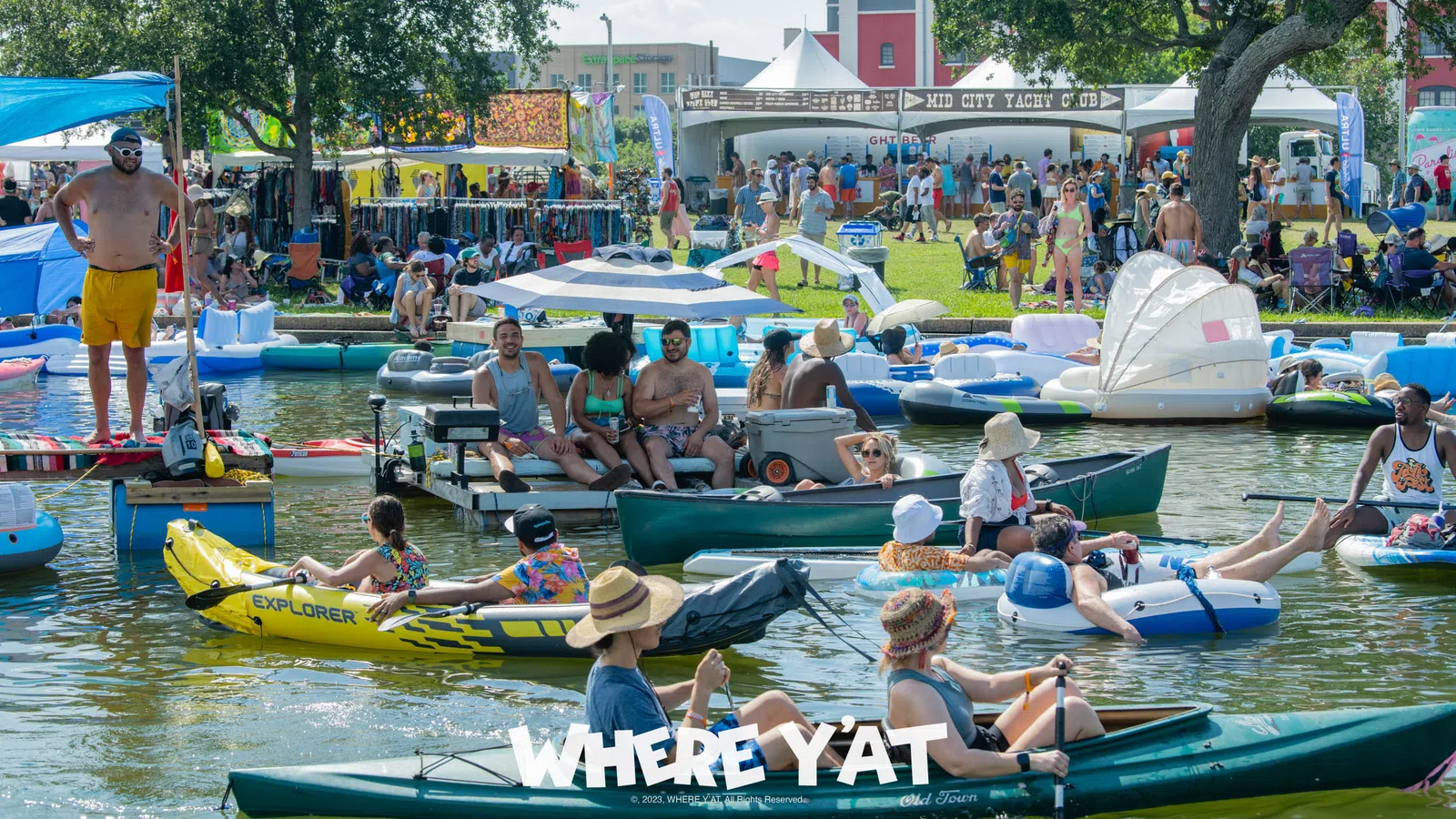 a group of people on boats