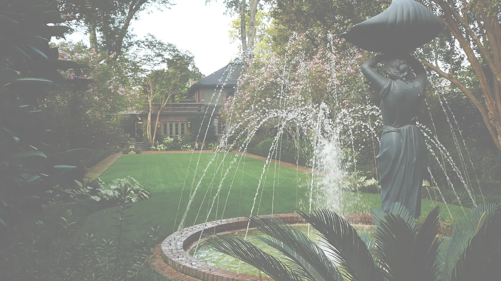 a statue in a garden