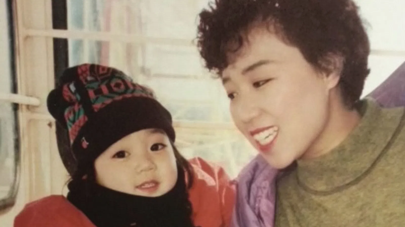 a person holding a baby