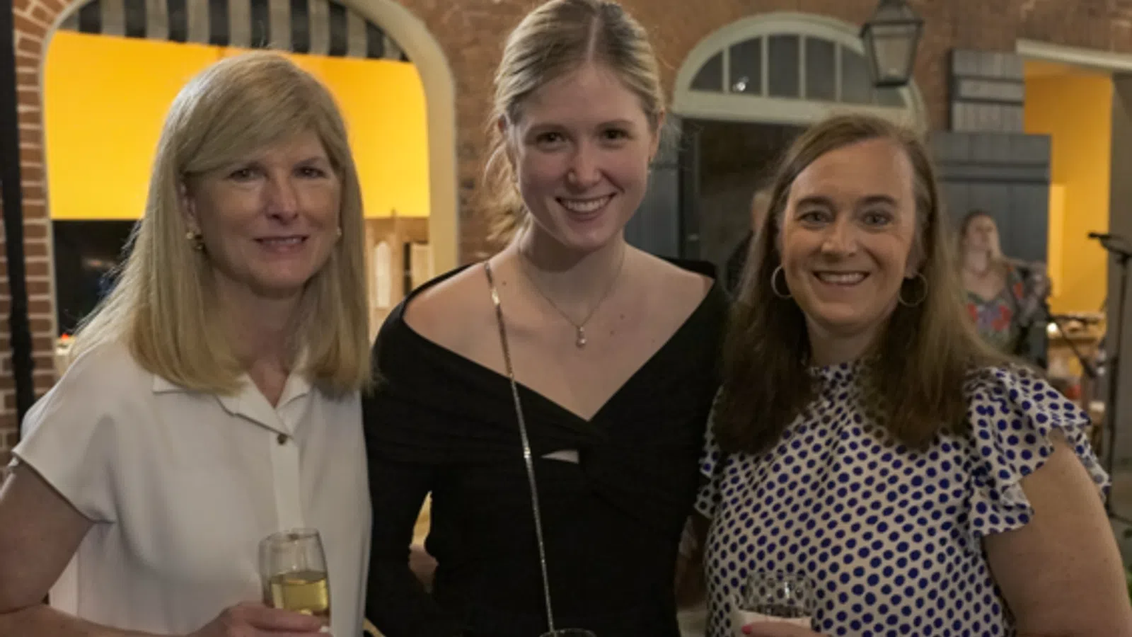 a group of women smiling