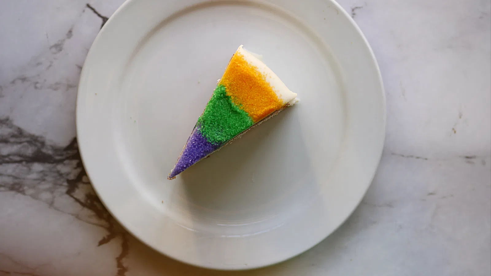 a white plate with a colorful object on it