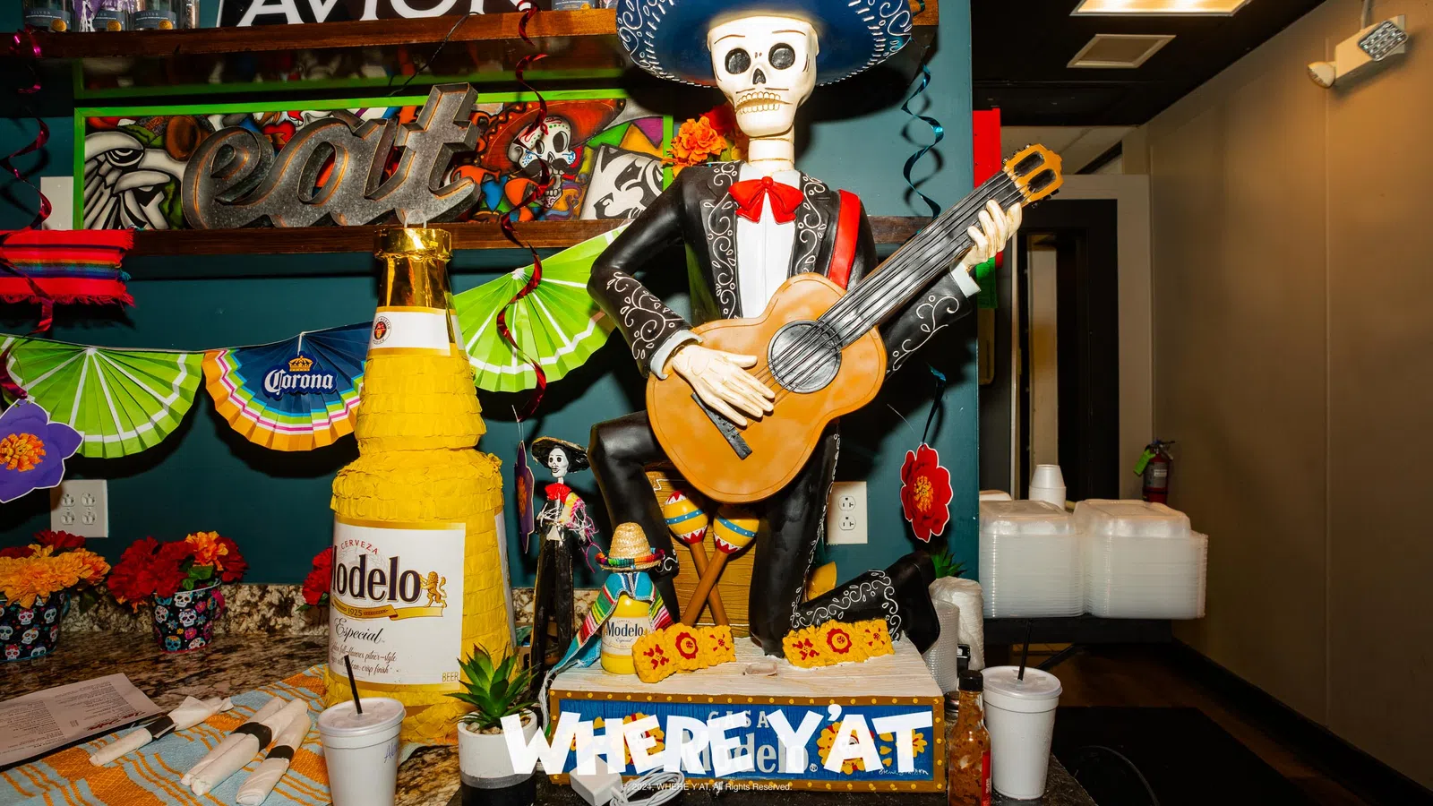 a skeleton playing a guitar