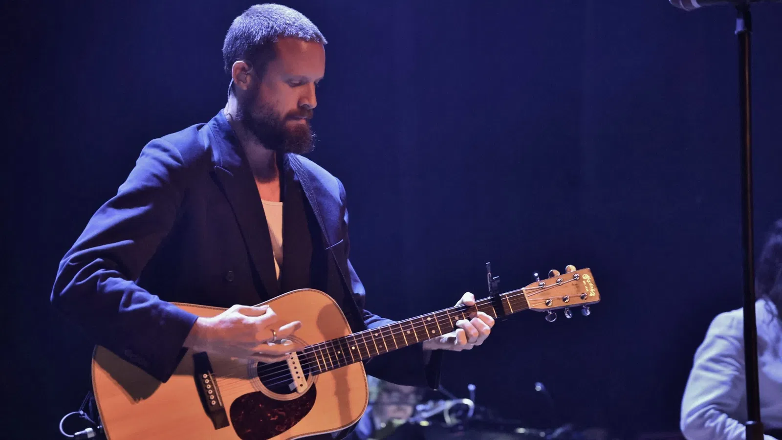 a man playing a guitar