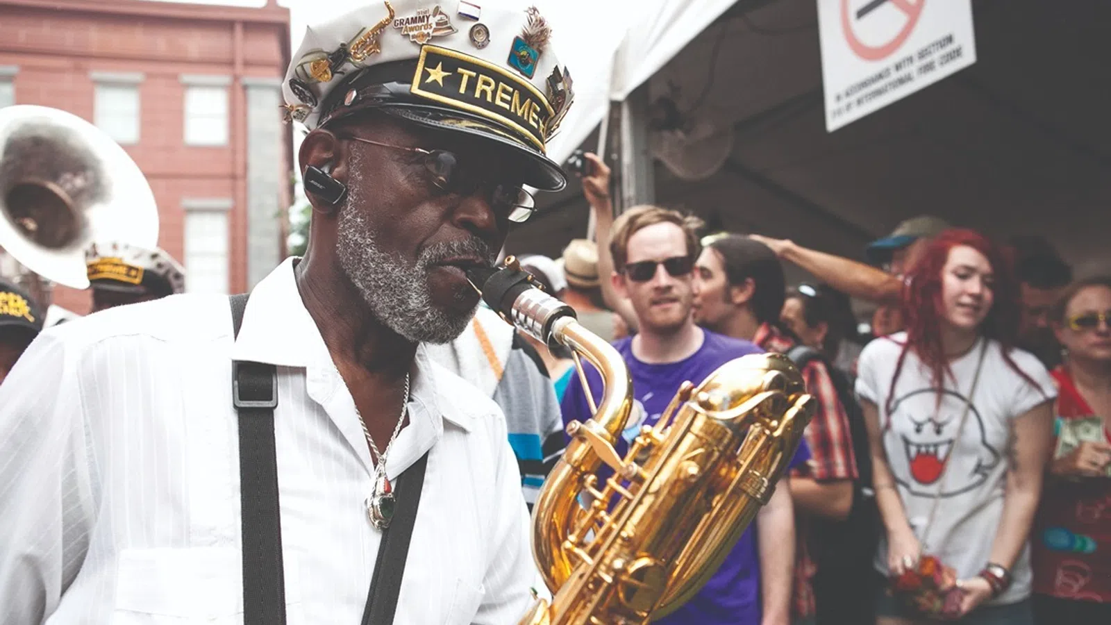 a man playing a saxophone