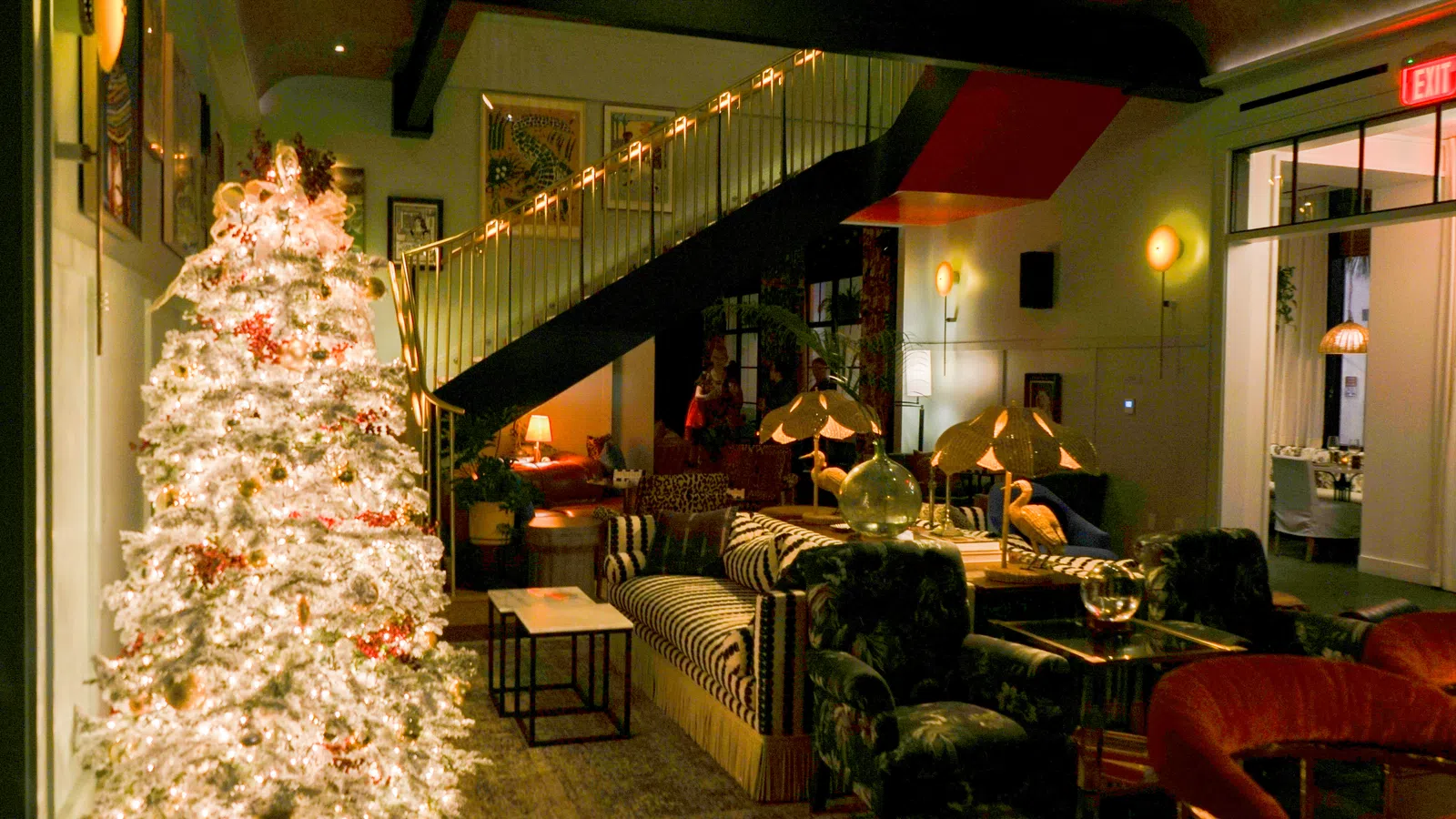 a living room with a christmas tree